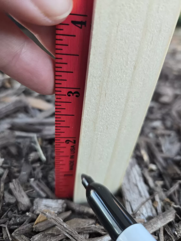 Winter craft: use a ruler to add measurements to your snow stick