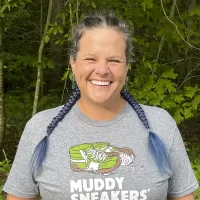 Headshot photo of Kim Lanzarotta, Core Instructor, smiling at the camera